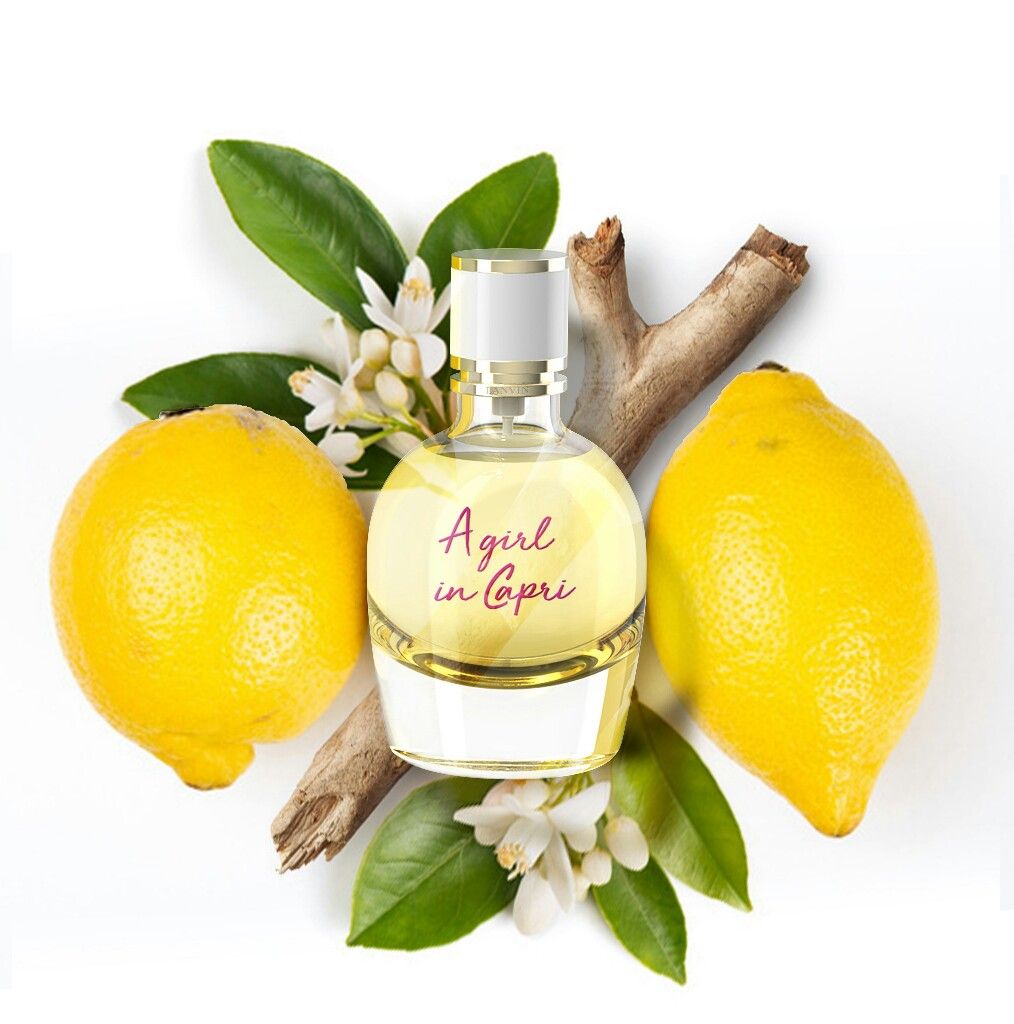 Lemons and a bottle of A girl in Capri perfume